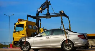 Truck towing a car